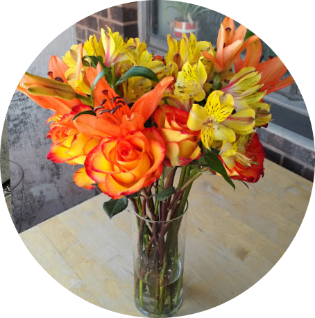 Orange lilies and alstroemeria arrangement