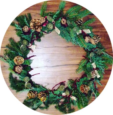 Handmade evergreen wreath with pine cones